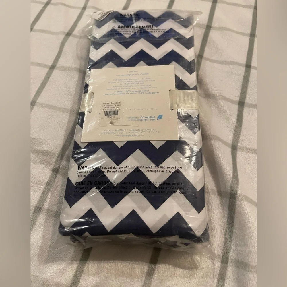 Pottery Barn kids navy and white chevron crib skirt‎